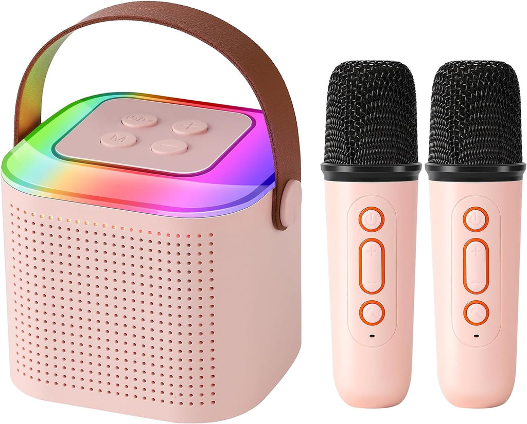 Pink kids karaoke machine with two wireless microphones and RGB LED lights
