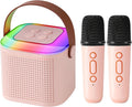 Pink kids karaoke machine with two wireless microphones and RGB LED lights