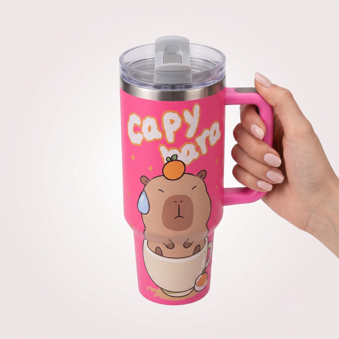 40 oz capybara tumbler held in hand - side view