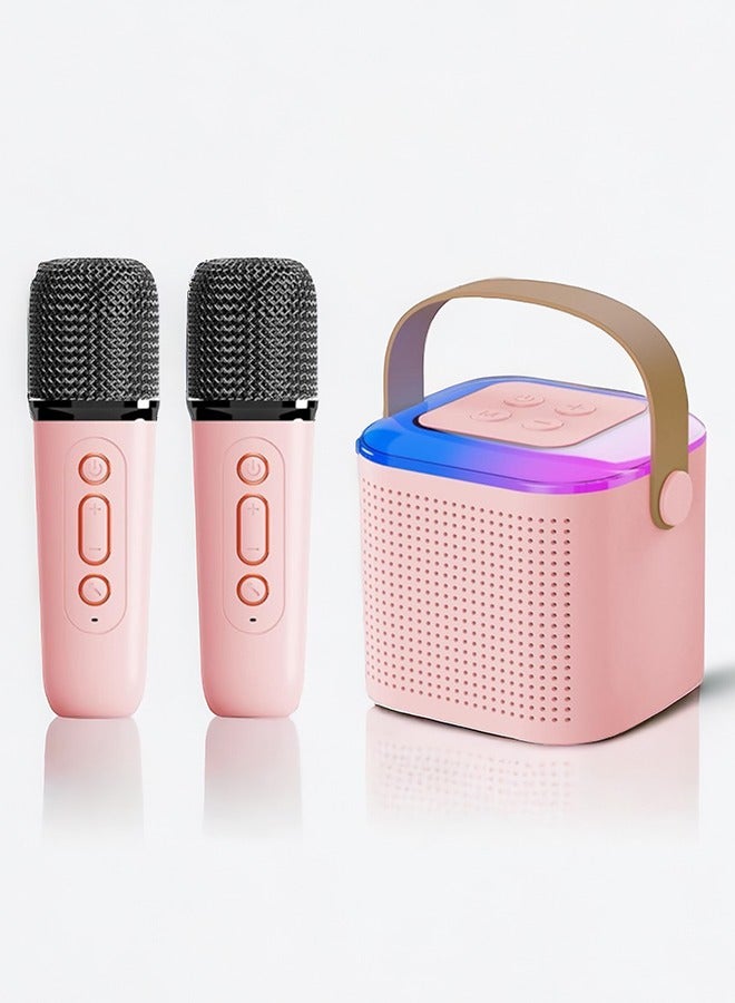 Kids karaoke machine in pink with two wireless microphones and LED lights